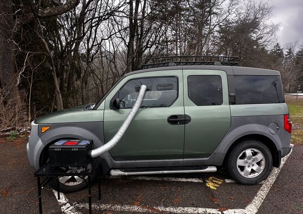 Honda Element dog window upgrade with dog inside